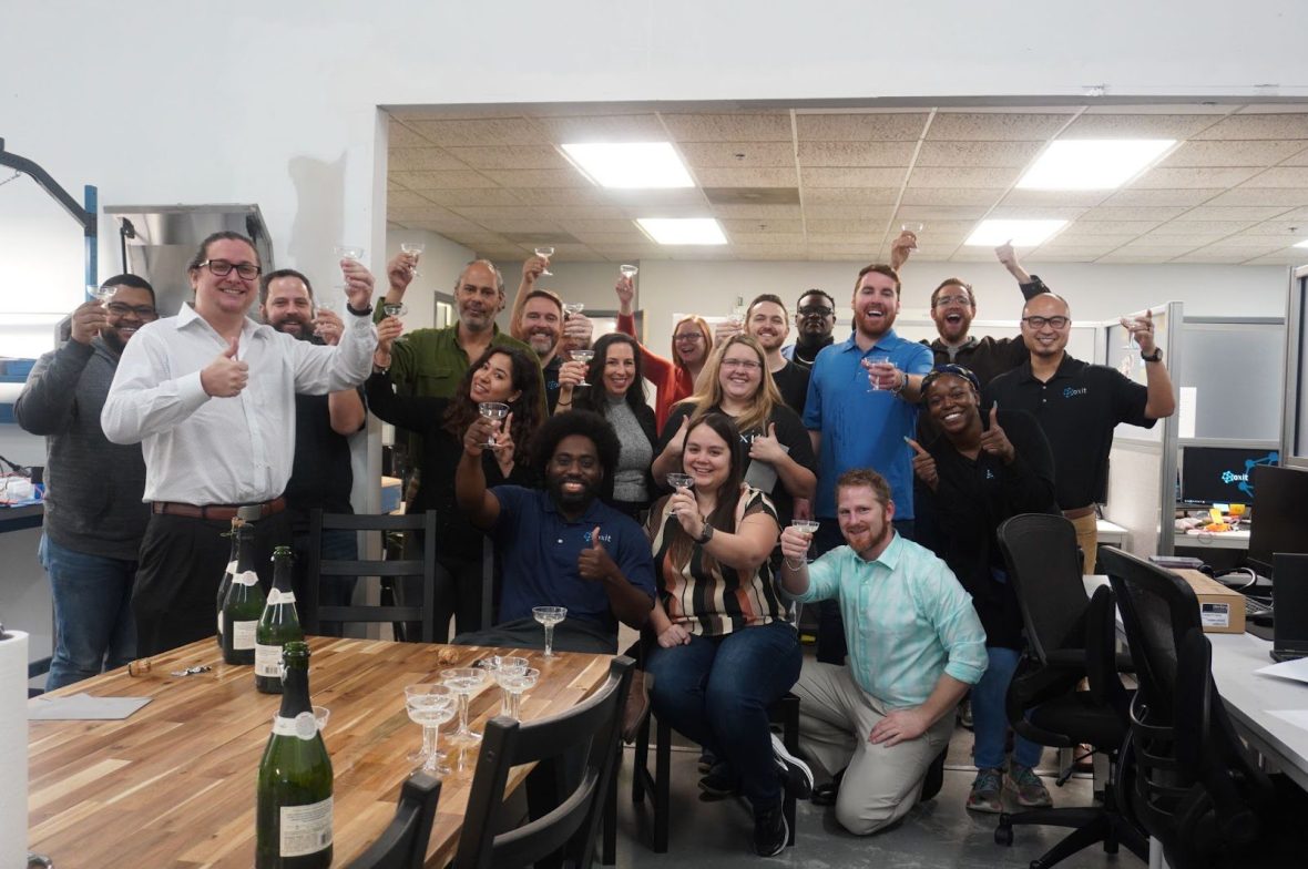 A group of cheering people celebrating