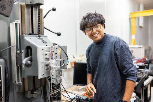 student working with engineering equipment