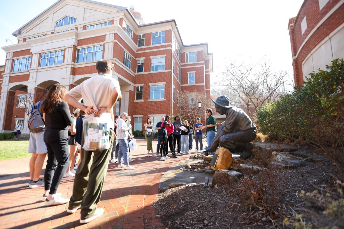 Large group of people on a campus tour