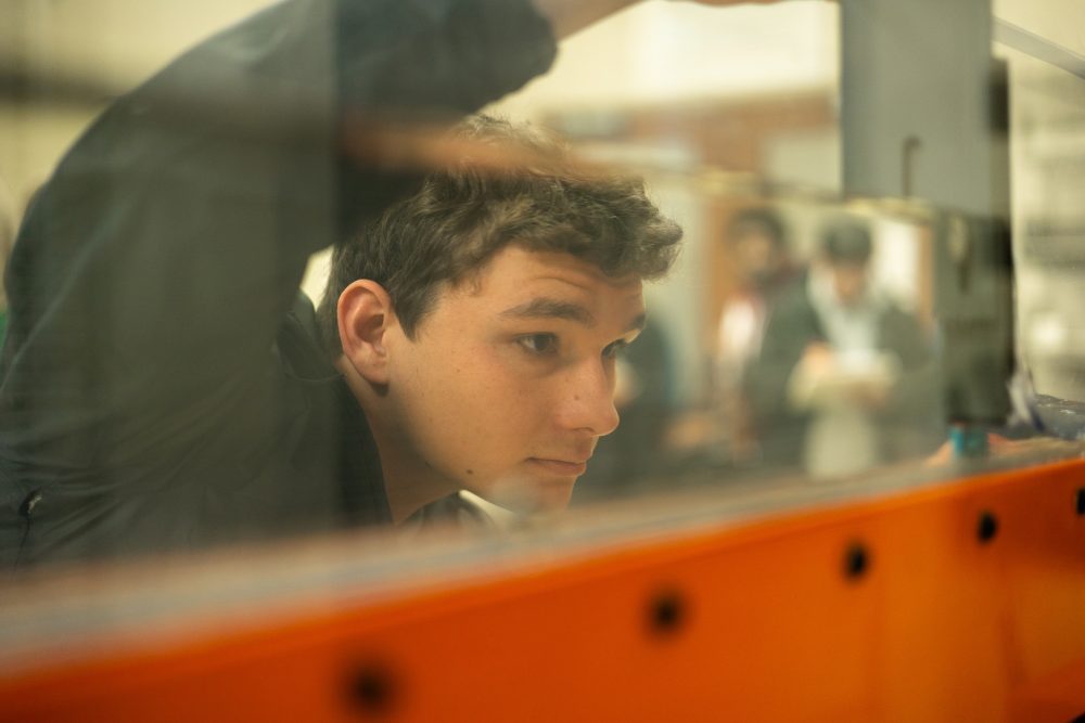 Engineering student working with equipment