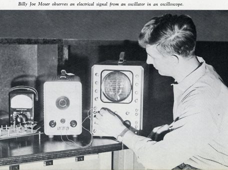 Billy Joe Moser observes an electrical signal from an oscillator