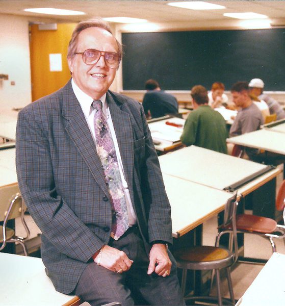 Bob Snyder sitting on a desk