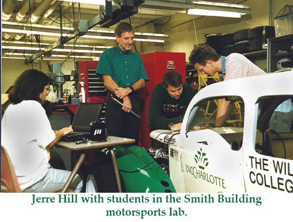 Jerre Hill with students in the Smith Building Motorsports Lab