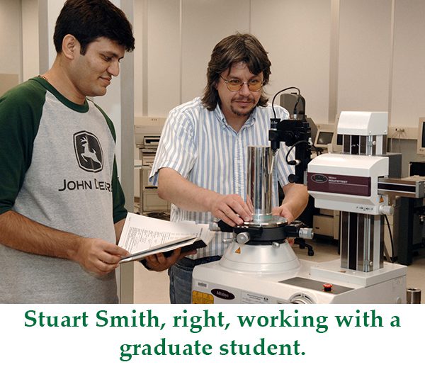 Stuart Smith, Right, working with a graduate student