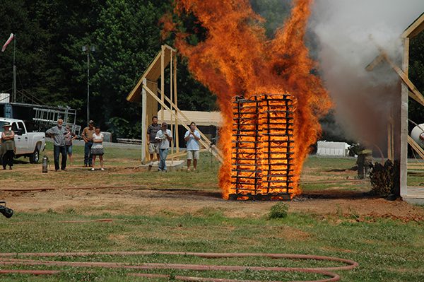 Students and faculty doing a burn test