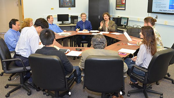Group of faculty members in a team meeting