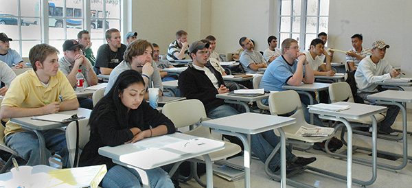 Group of students learning in a classroom