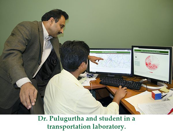 Dr. Srinivas Pulugartha and student in a transportation lab