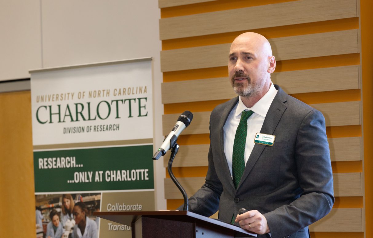 John Daniels speaks from podium