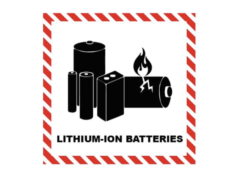 a group of black battery icons, one with flames, surround by a red-and-white striped border