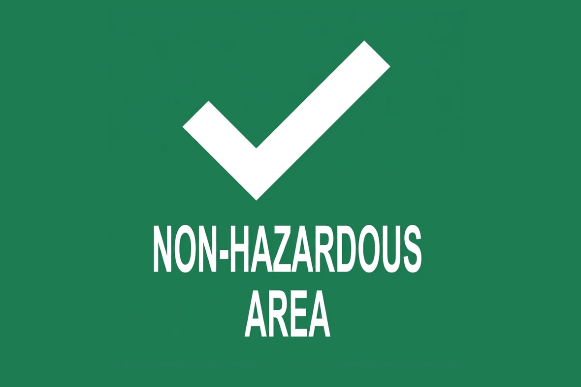 Green rectangular box with a white check and the text "Non-Hazardous Area"