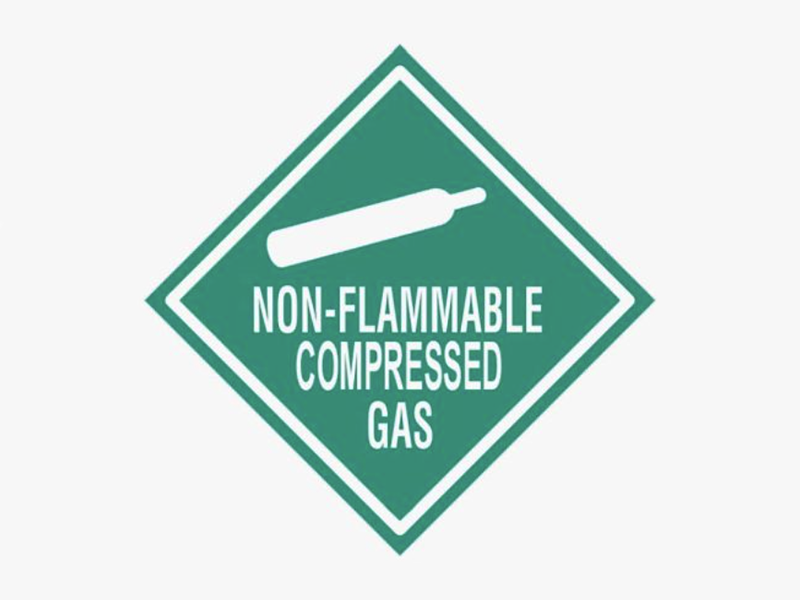 Green Diamond Shape with an icon of a gas tank and the words "Non-Flammable Compressed Gas" in white