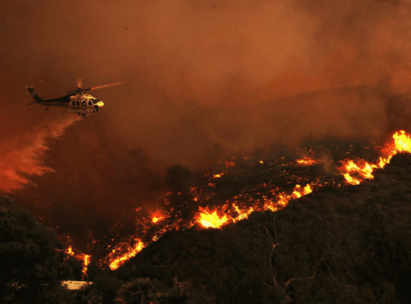 sky shot of land burning