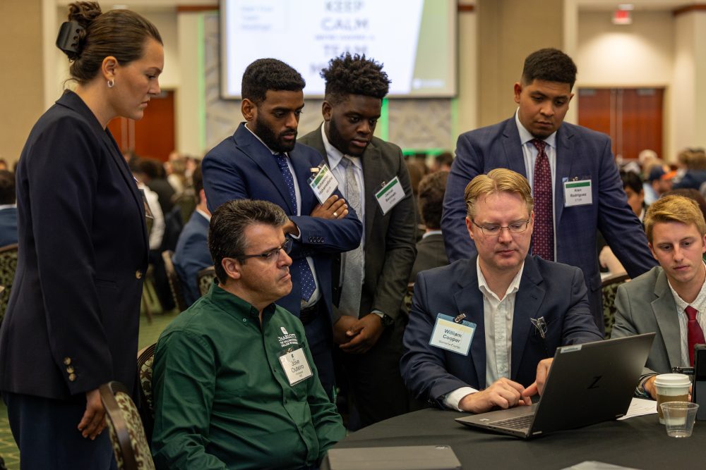 Group of people working at a conference
